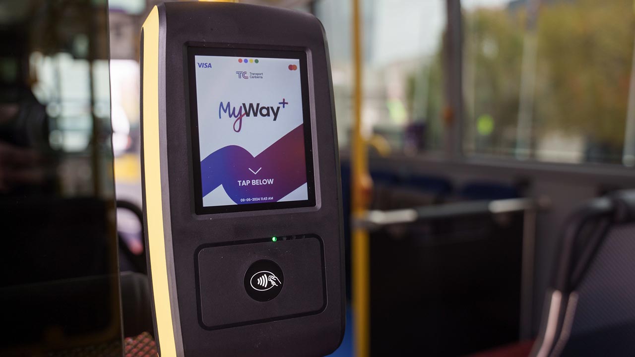 A picture of a payment reader on public transport.